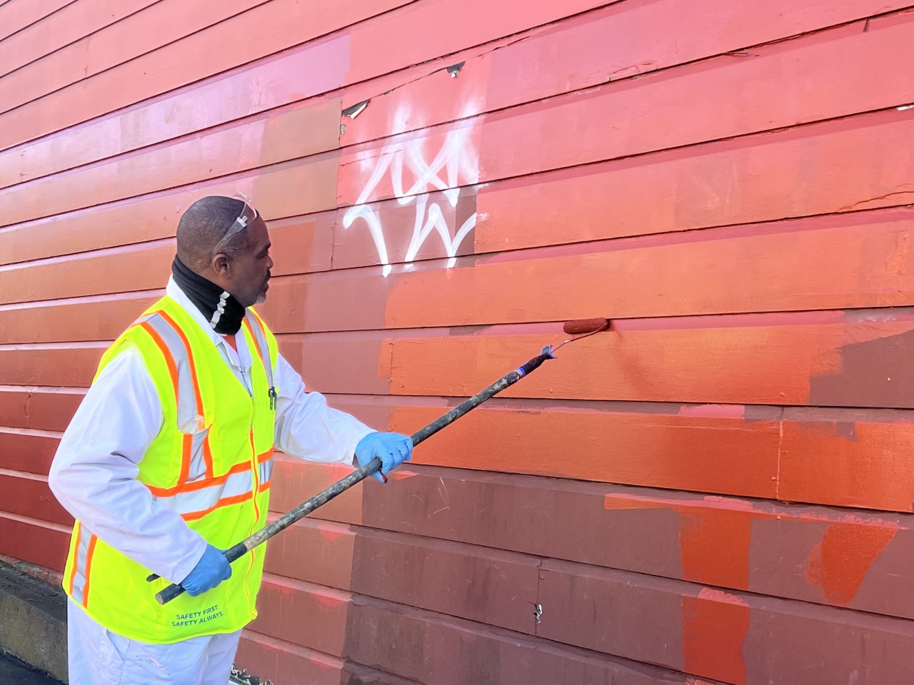 Staff painting out graffiti